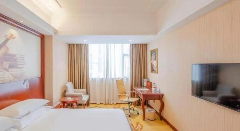 Bed in Vienna Hotel Guangdong Zhongshan Ancient Town Lighting Expo Center