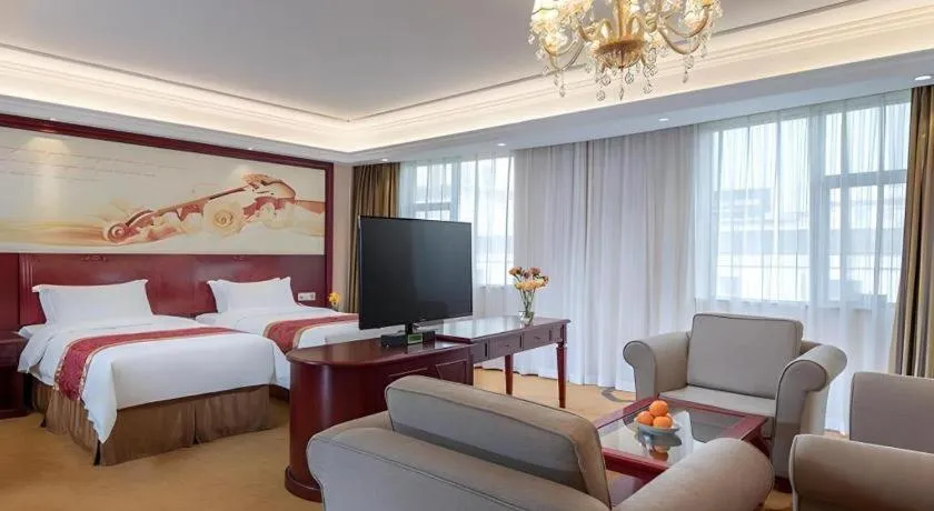 Bed in Vienna Hotel Guangdong Zhongshan Ancient Town Lighting Expo Center