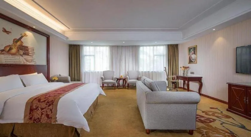 Bed in Vienna Hotel Guangdong Zhongshan Ancient Town Lighting Expo Center