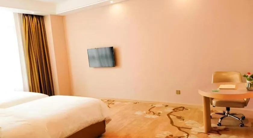 Bed in Vienna Hotel Fujian Fuqing Wanda Plaza