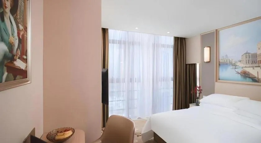 Bed in Vienna Hotel Fujian Fuqing Wanda Plaza