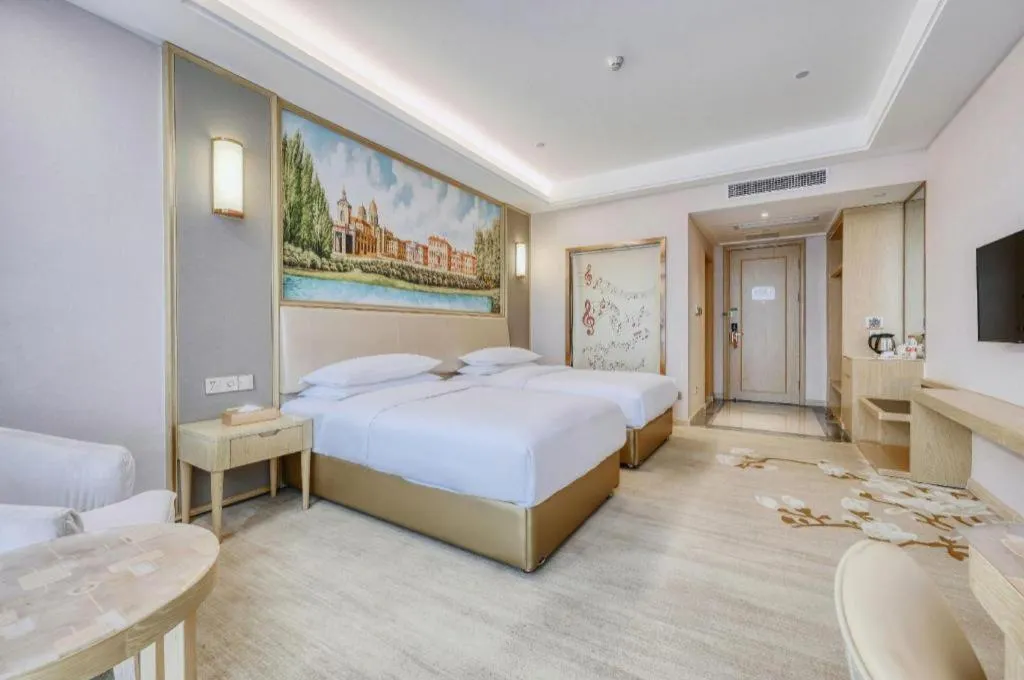 Bed in Vienna Hotel Fujian Fuqing Wanda Plaza