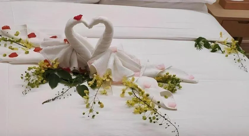 Bed in Vienna Hotel Fujian Fuqing Wanda Plaza