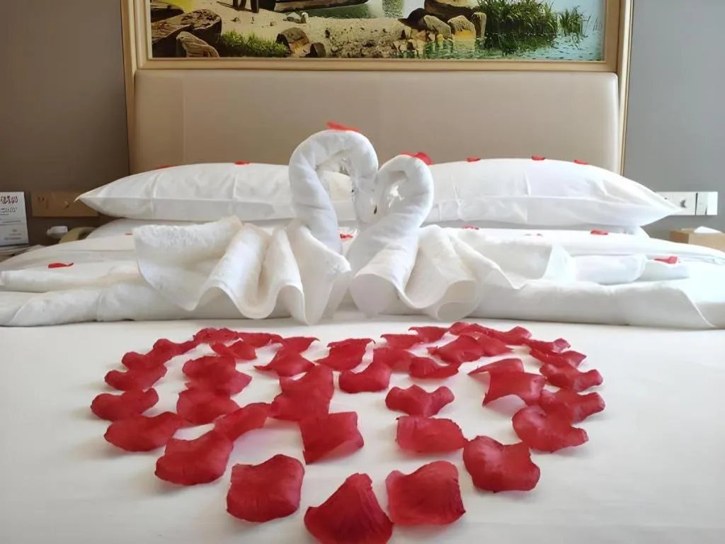 Bed in Vienna Hotel Fujian Fuqing Wanda Plaza