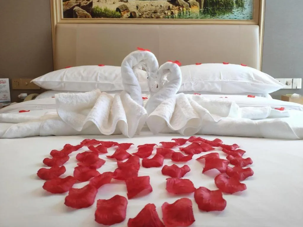 Bed in Vienna Hotel Fujian Fuqing Wanda Plaza