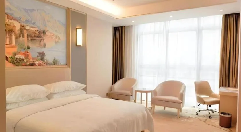 Bed in Vienna Hotel Fujian Fuqing Wanda Plaza