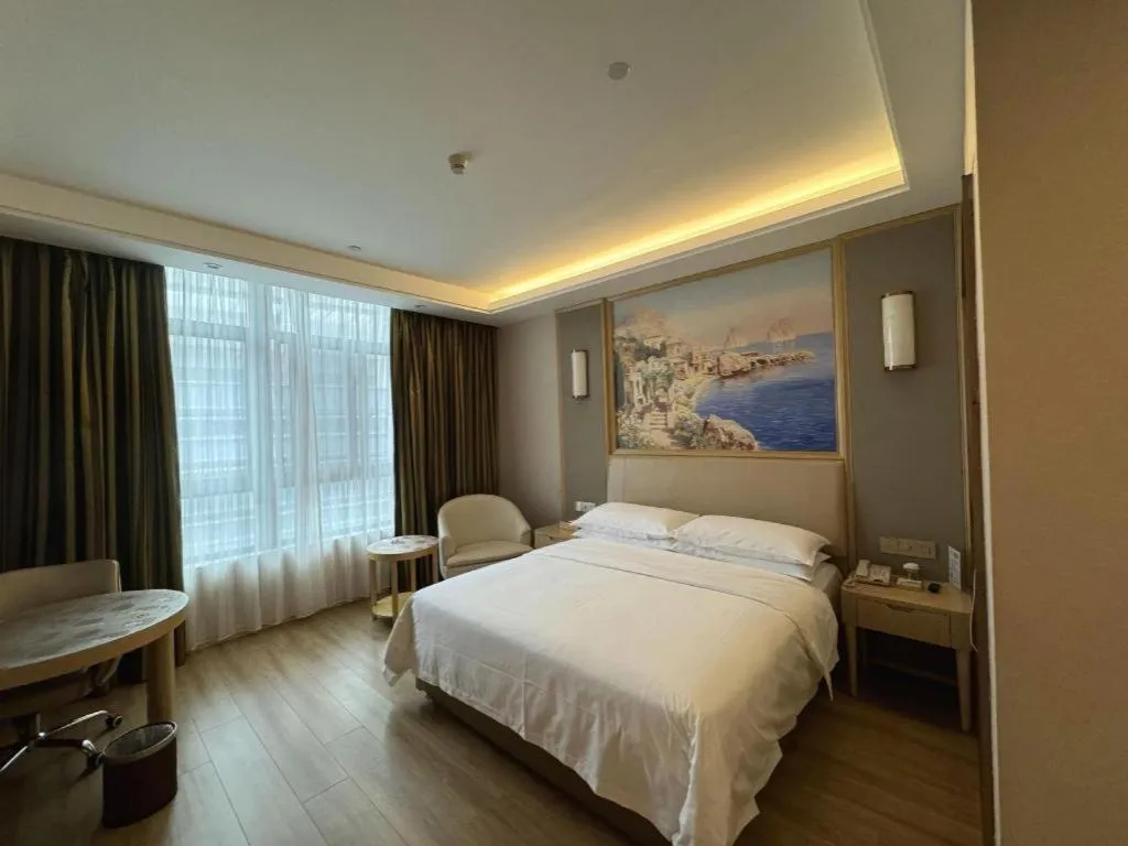 Bed in Vienna Hotel Fujian Fuqing Wanda Plaza