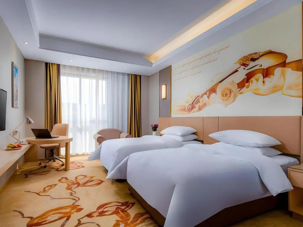 Bed in Vienna Hotel Anhui Fuyang Funan Bailing Apartment