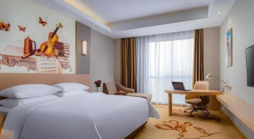 Bed in Vienna Hotel Anhui Fuyang Funan Bailing Apartment