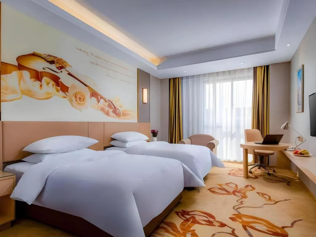 Bed in Vienna Hotel Anhui Fuyang Funan Bailing Apartment