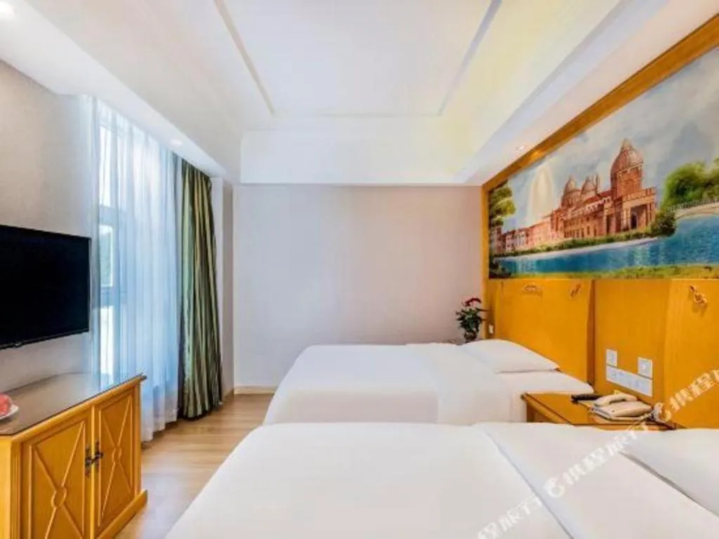 Bed in Vienna Hotel Tianjin Zhongbei Town
