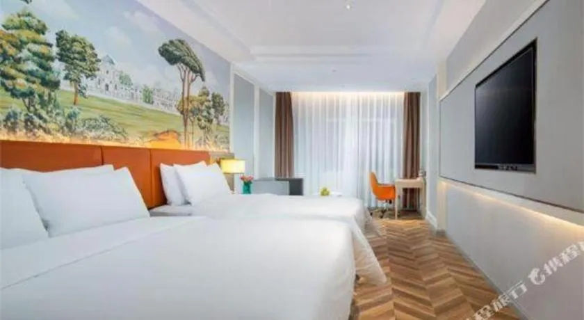 Bed in Vienna Hotel Jinan Beiyuan Street Red Star Macalline