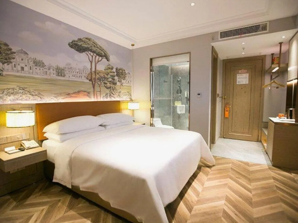 Bed in Vienna Hotel Jinan Beiyuan Street Red Star Macalline