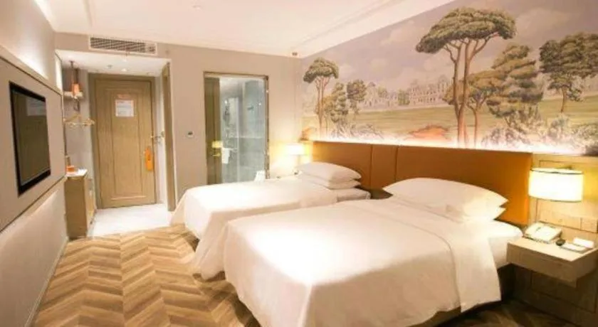 Bed in Vienna Hotel Jinan Beiyuan Street Red Star Macalline