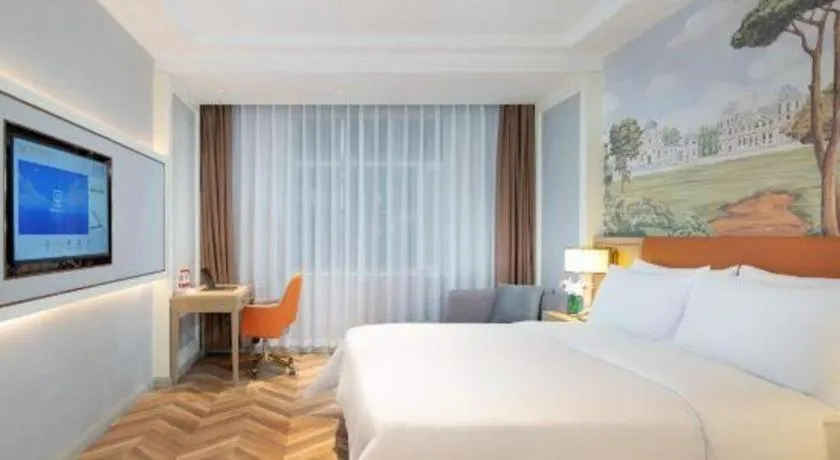 Bed in Vienna Hotel Jinan Beiyuan Street Red Star Macalline