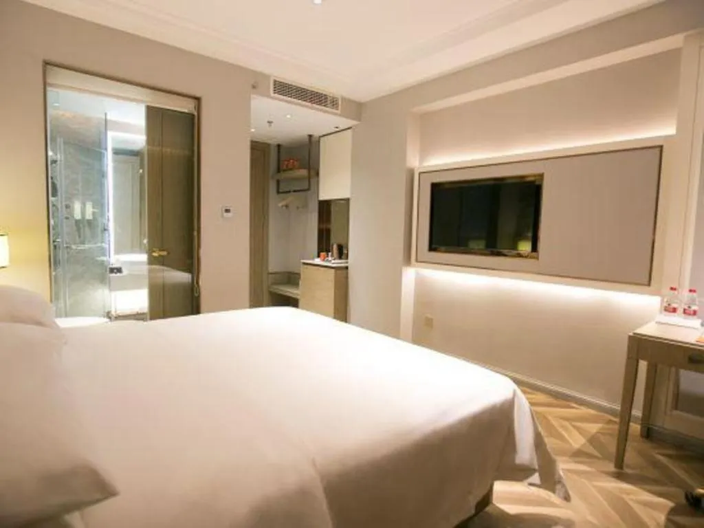 Bed in Vienna Hotel Jinan Beiyuan Street Red Star Macalline