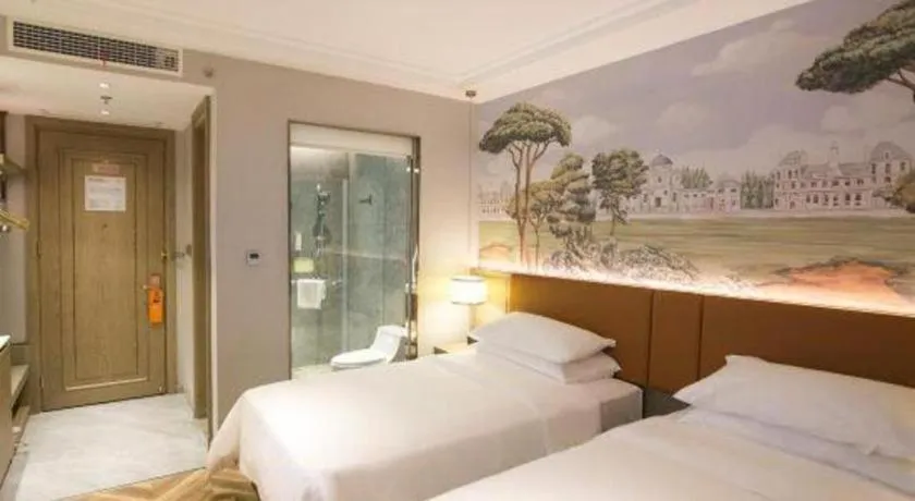 Bed in Vienna Hotel Jinan Beiyuan Street Red Star Macalline