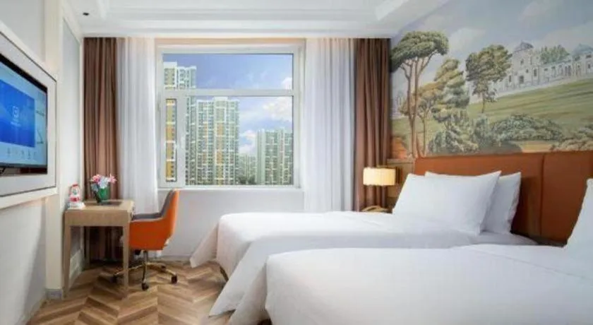 Bed in Vienna Hotel Jinan Beiyuan Street Red Star Macalline