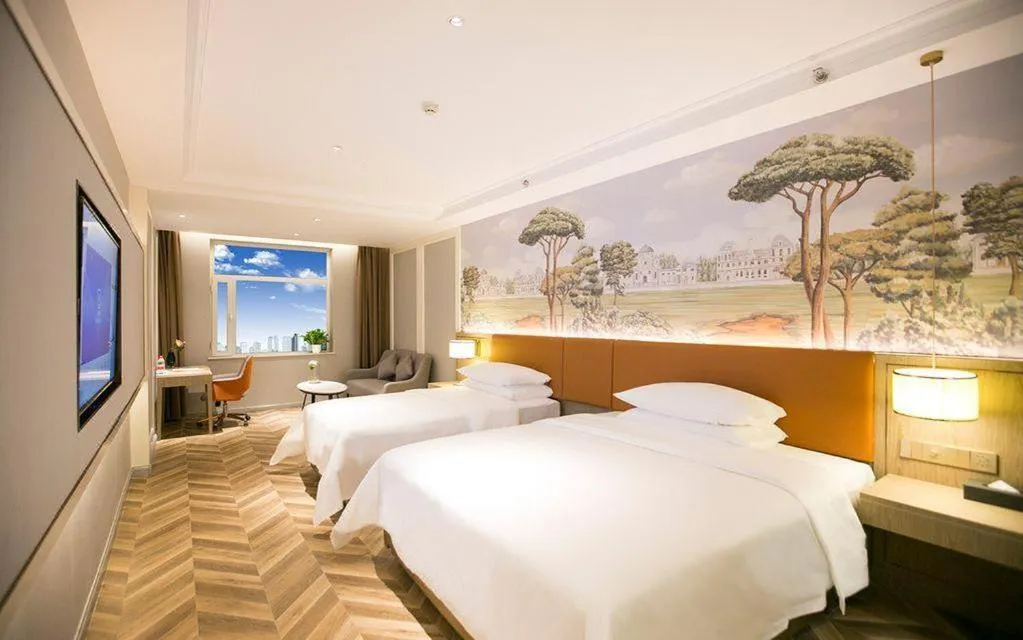 Bed in Vienna Hotel Jinan Beiyuan Street Red Star Macalline