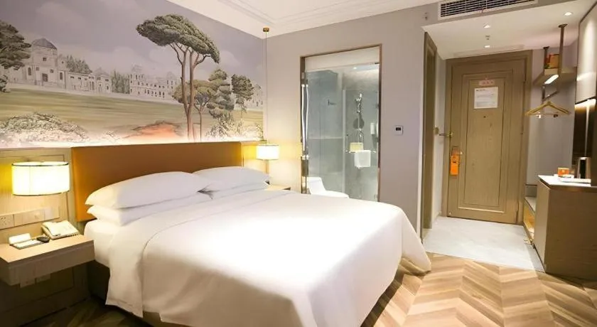 Bed in Vienna Hotel Jinan Beiyuan Street Red Star Macalline