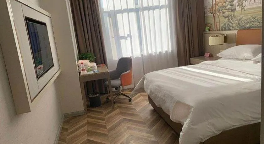 Bed in Vienna Hotel Jinan Beiyuan Street Red Star Macalline