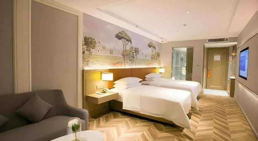 Bed in Vienna Hotel Jinan Beiyuan Street Red Star Macalline