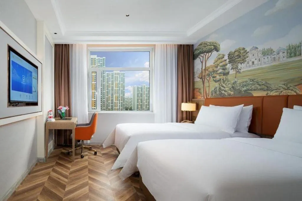 Bed in Vienna Hotel Jinan Beiyuan Street Red Star Macalline