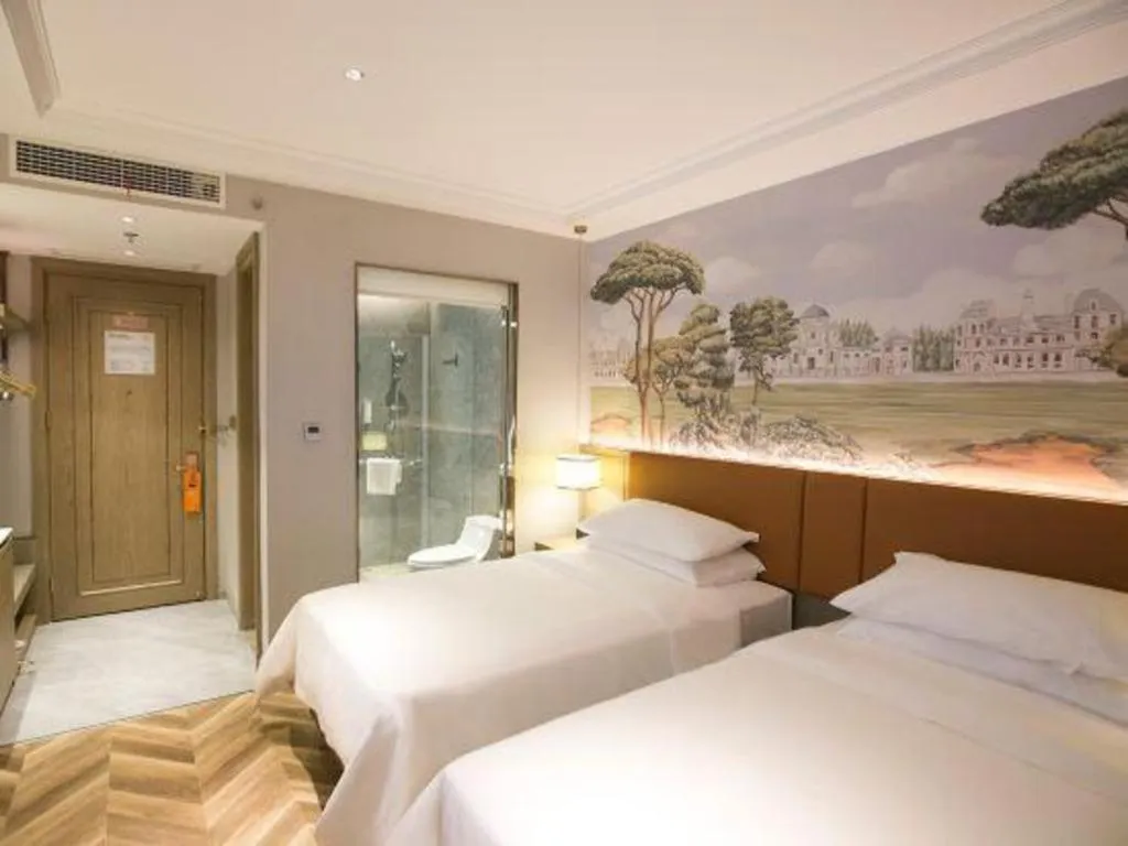 Bed in Vienna Hotel Jinan Beiyuan Street Red Star Macalline