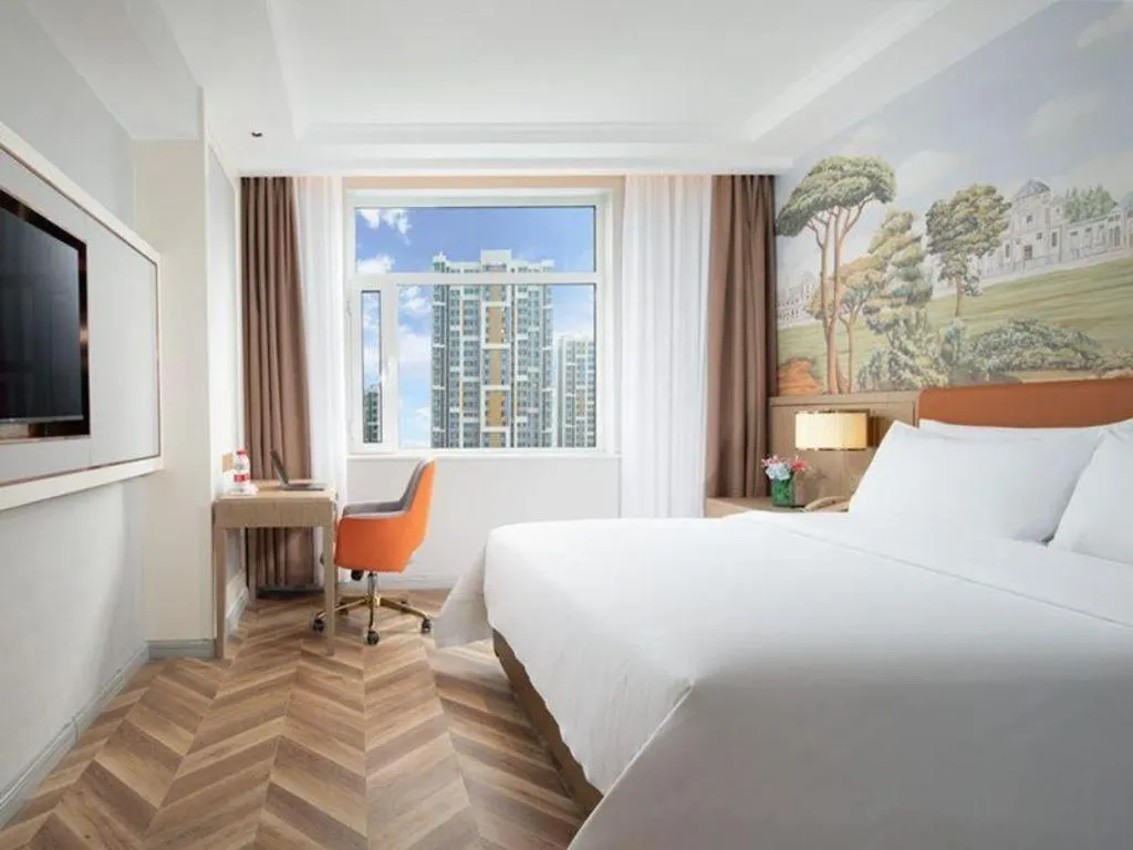 Bed in Vienna Hotel Jinan Beiyuan Street Red Star Macalline