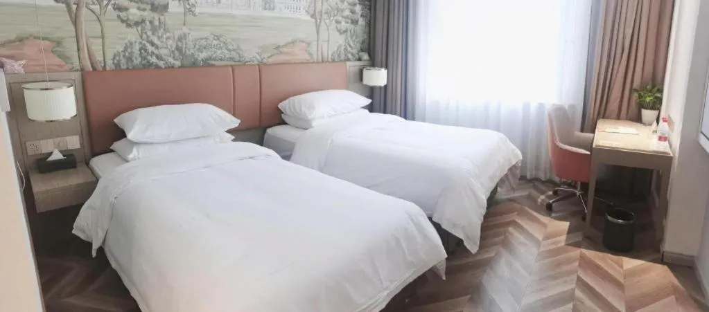Bed in Vienna Hotel Jinan Beiyuan Street Red Star Macalline