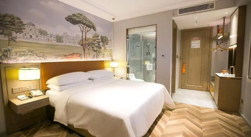 Bed in Vienna Hotel Jinan Beiyuan Street Red Star Macalline