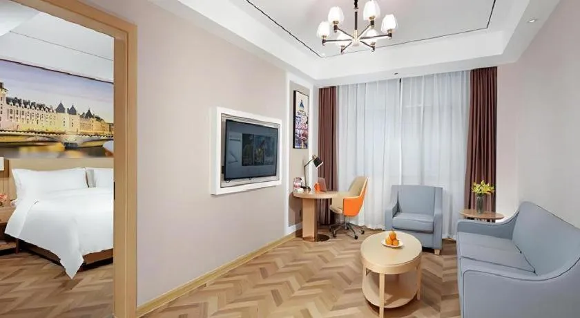 Bed in Vienna Hotel Guangxi Baise Xilin County Juting Cultural Arts Center