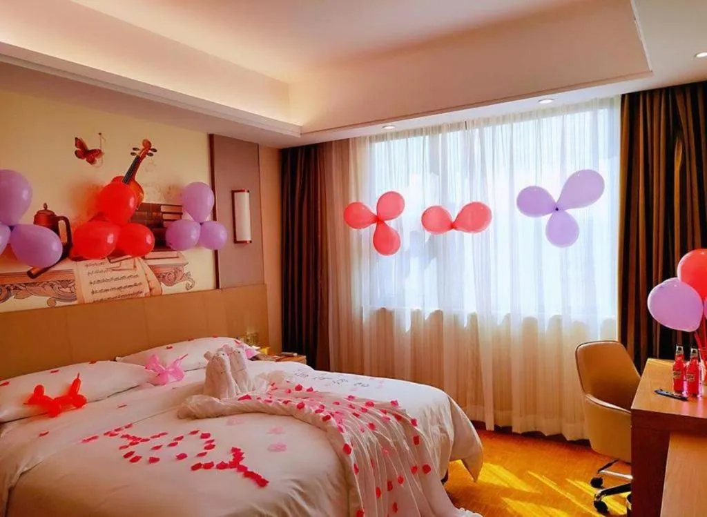 Bed in Vienna Hotel Guangxi Wuzhou High-Tech