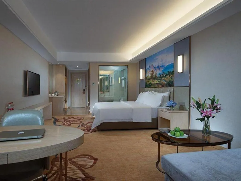 Bed in Vienna Hotel Guangxi Wuzhou High-Tech