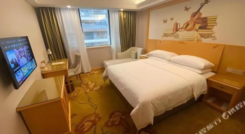 Bed in Vienna Hotel Guangdong Shaoguan Ruyuan Yao Cultural Square