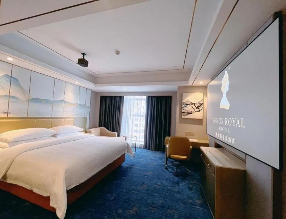 Bed in Venus Royal Hotel Guangxi Wuzhou Sanqicheng Meiguihu Park