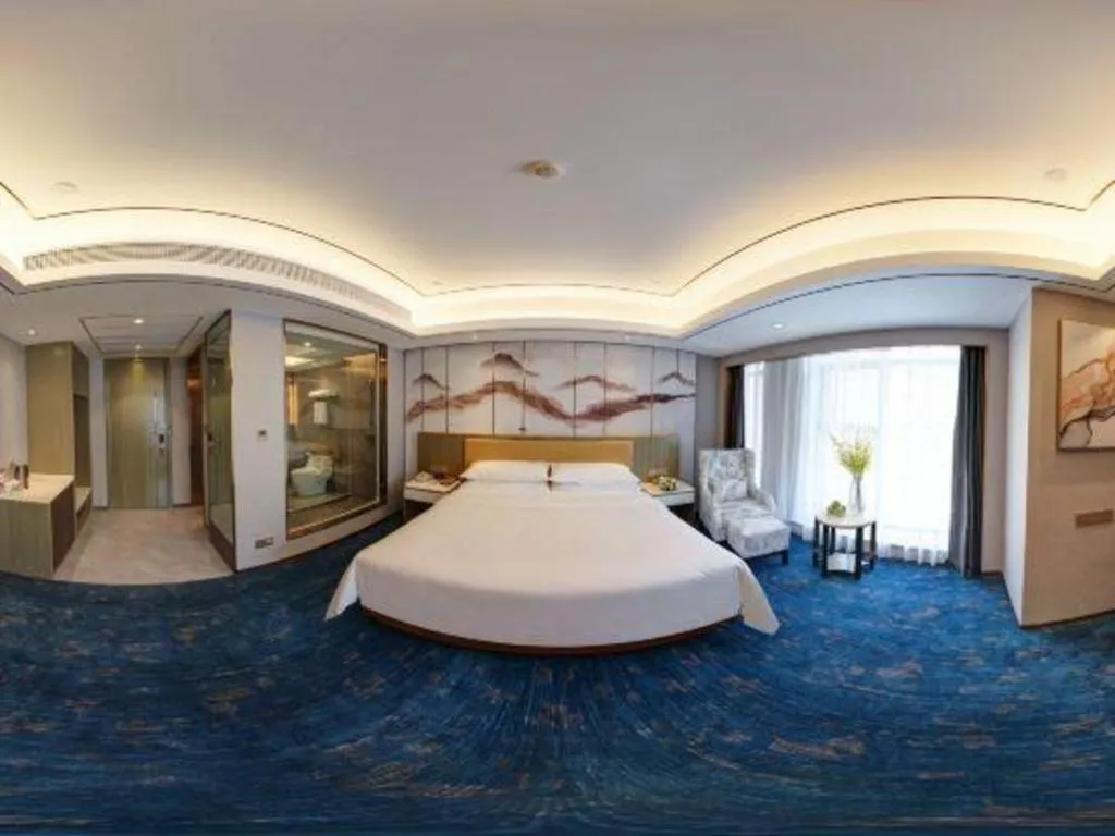 Bed in Venus Royal Hotel Guangxi Wuzhou Sanqicheng Meiguihu Park