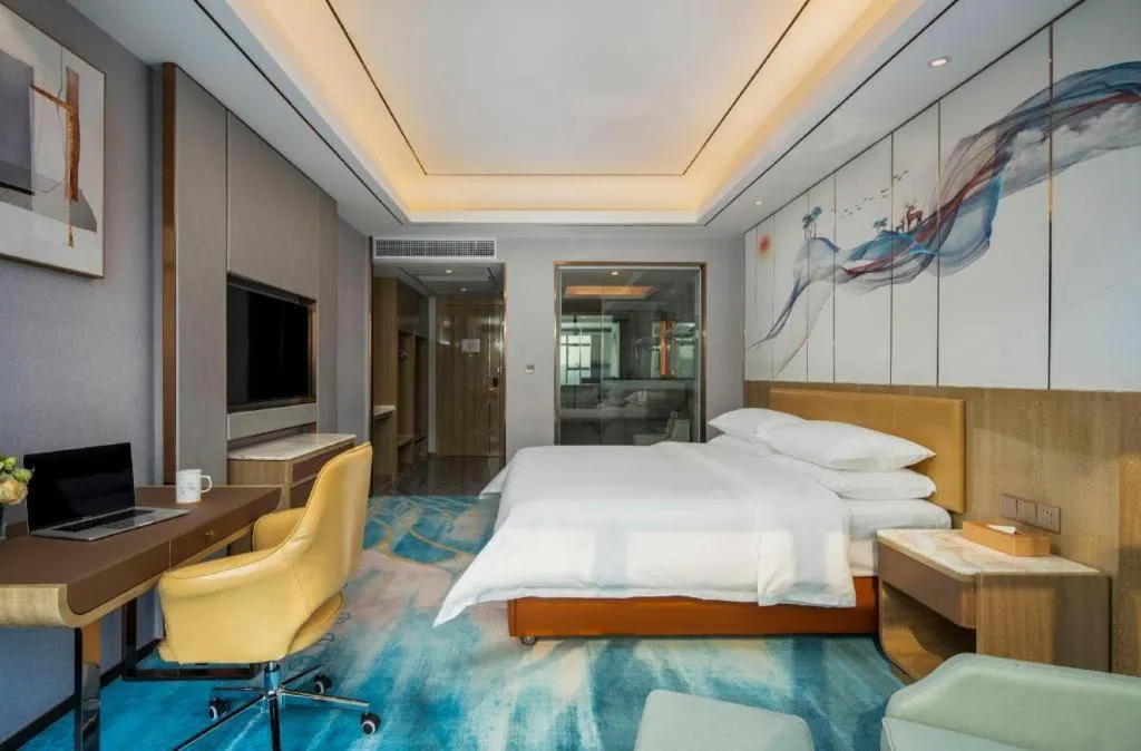 Bed in Venus Royal Hotel Guangxi Wuzhou Sanqicheng Meiguihu Park