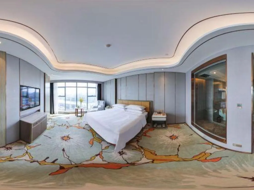 Bed in Venus Royal Hotel Guangxi Wuzhou Sanqicheng Meiguihu Park