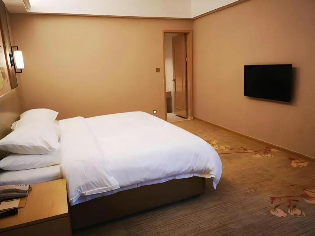 Bed in Vienna Hotel Anhui Taihe Baitai Xingma International