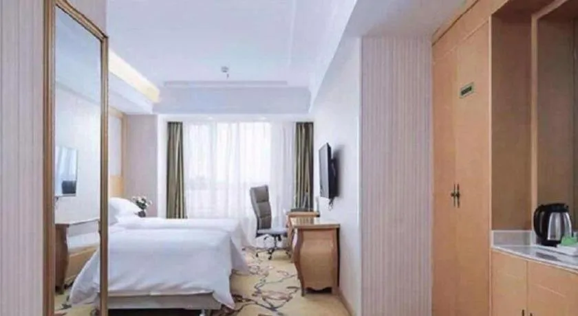 Bed in Vienna Hotel Anhui Taihe Baitai Xingma International