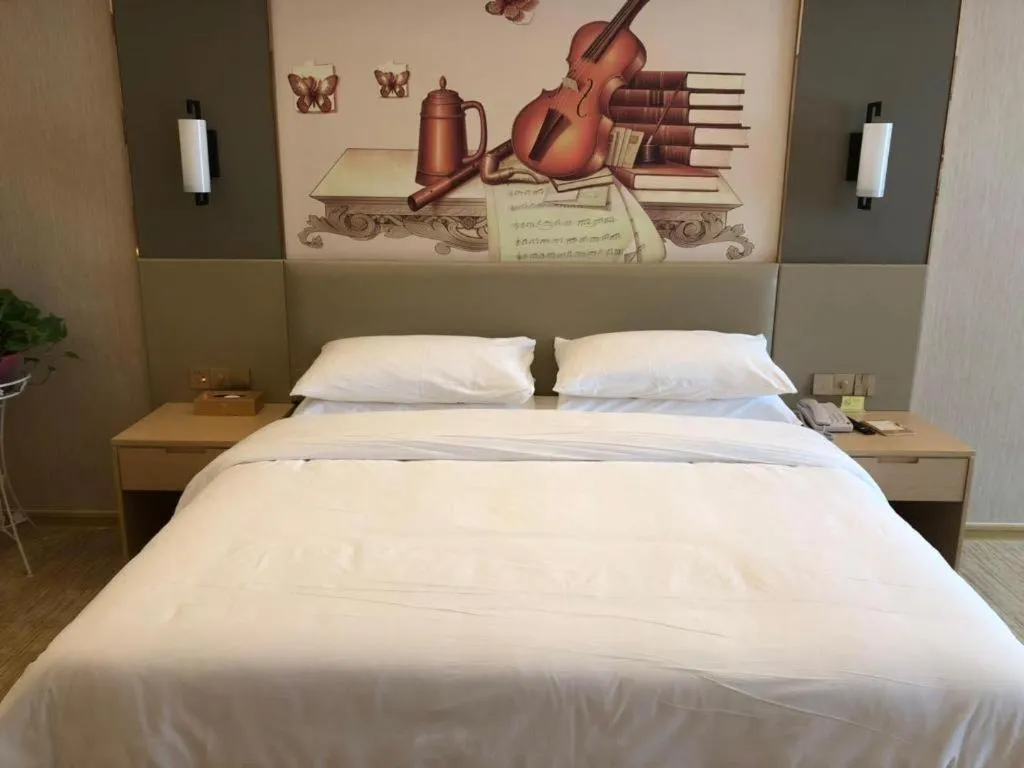 Bed in Vienna Hotel Anhui Taihe Baitai Xingma International