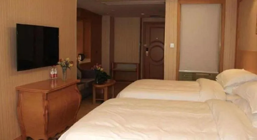 Bed in Vienna Hotel Anhui Taihe Baitai Xingma International