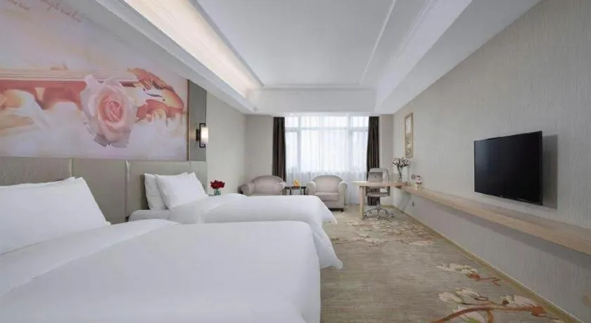 Bed in Vienna Hotel Anhui Taihe Baitai Xingma International