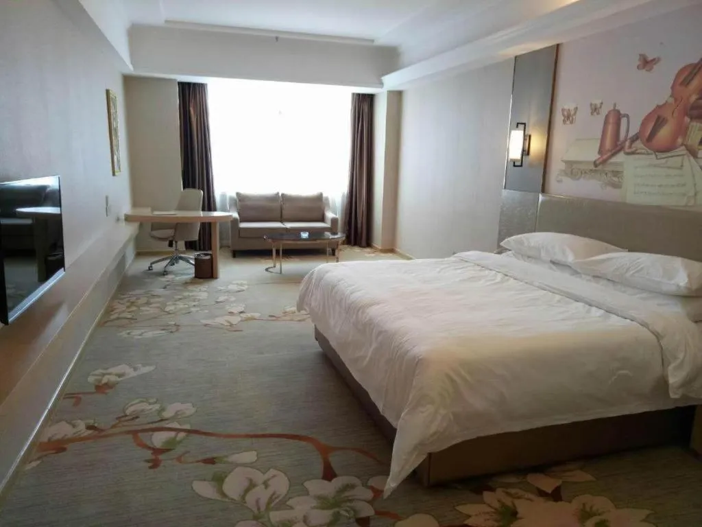 Bed in Vienna Hotel Anhui Taihe Baitai Xingma International