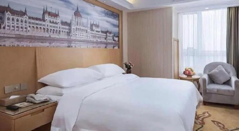 Bed in Vienna Hotel Anhui Taihe Baitai Xingma International