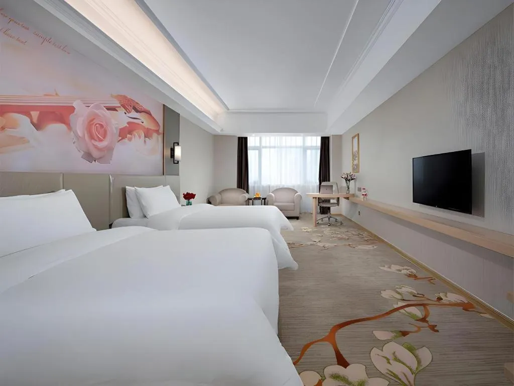 Bed in Vienna Hotel Anhui Taihe Baitai Xingma International