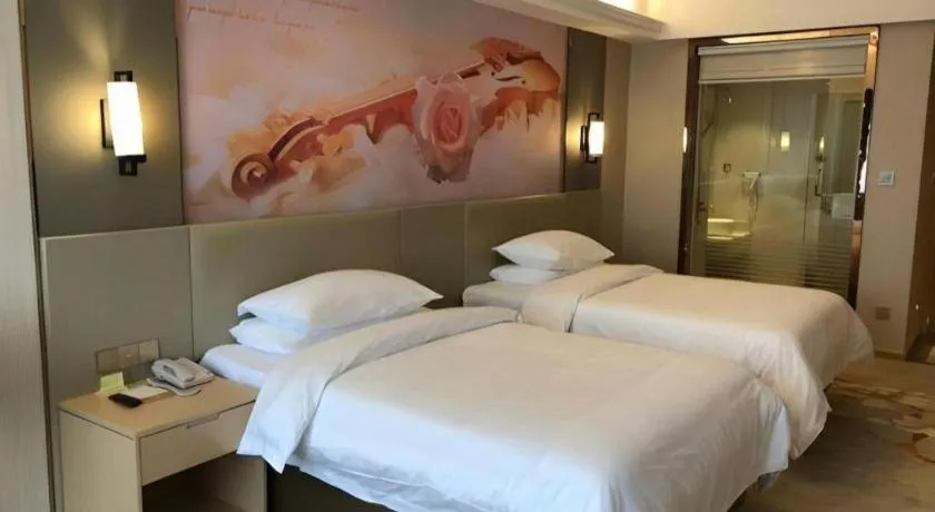 Bed in Vienna Hotel Anhui Taihe Baitai Xingma International