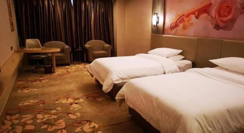 Bed in Vienna Hotel Anhui Taihe Baitai Xingma International