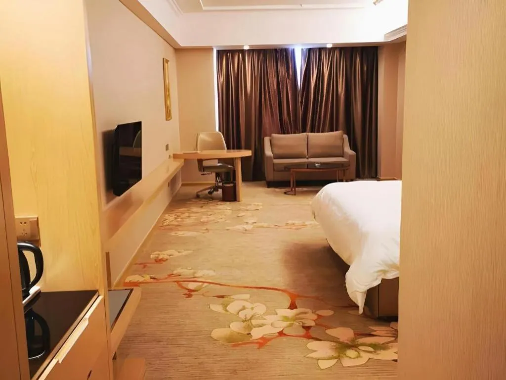 Bed in Vienna Hotel Anhui Taihe Baitai Xingma International